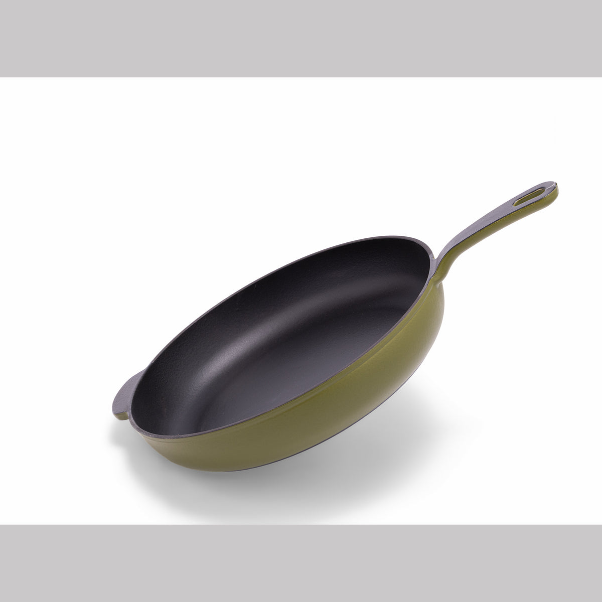 Green enameled cast iron skillet by BUCHYMIX Nigeria, showing a smooth, durable cooking surface and sturdy handle.