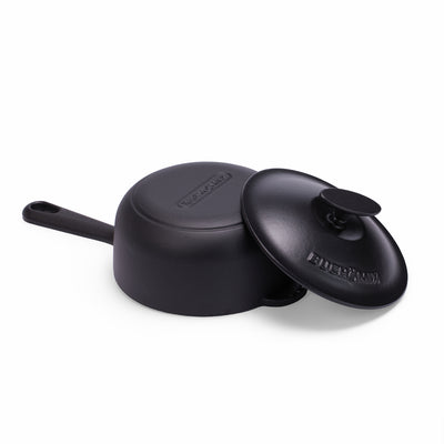 Black 2-quart enameled cast iron saucepan with lid by BUCHYMIX Nigeria, showcasing smooth black enamel coating and sturdy handle.