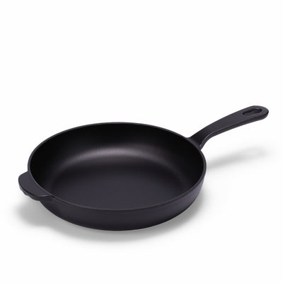 Black enameled cast iron skillet by BUCHYMIX NIGERIA, showing a smooth, glossy coating and sturdy handle for versatile cooking.