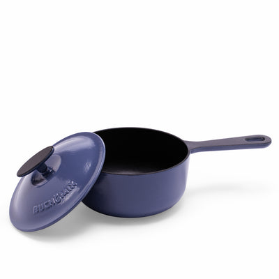 Blue 2-quart enameled cast iron saucepan with lid by BUCHYMIX Nigeria, showing a smooth, glossy finish and sturdy handle.