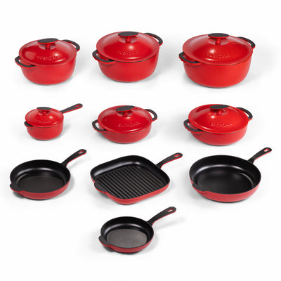 Red enameled cast iron cookware set with 22 pieces from BUCHYMIX NIGERIA, including pots, pans, and lids on a kitchen countertop.